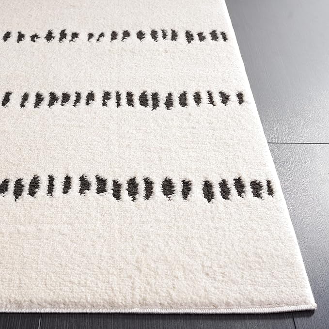 SAFAVIEH Melody Collection Area Rug - 10' x 14', Ivory/Black, Geometric Design, Ideal for High Traffic Areas in Living Room, Bedroom, Dining (MEL114A)